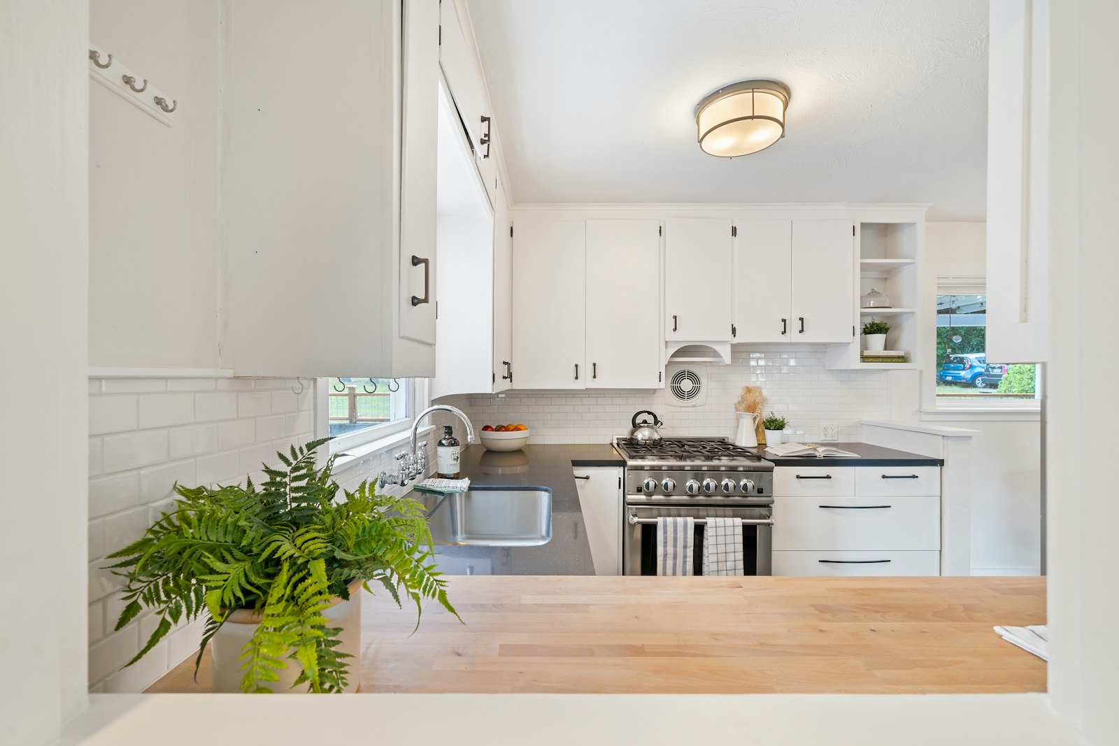 A dated builder-grade kitchen